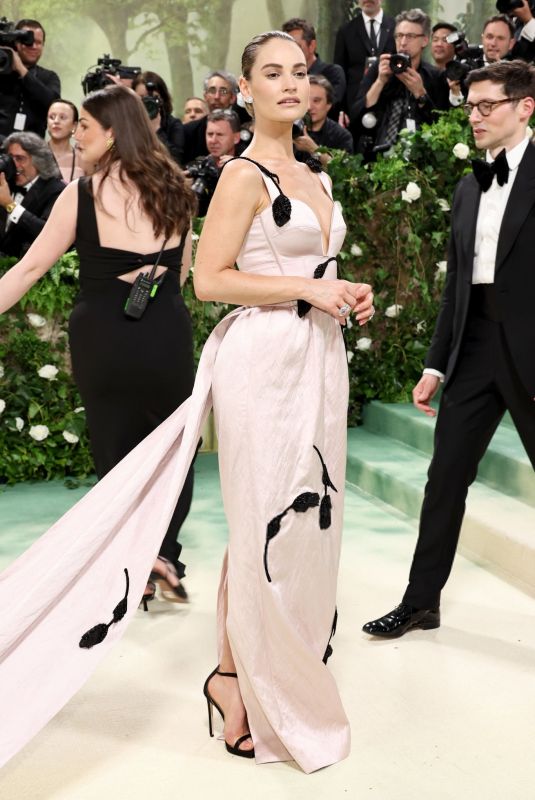 LILY JAMES at Met Gala Celebrating Sleeping Beauties: Reawakening Fashion in New York 05/06/2024