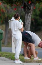 OLIVIA CULPO and Christian McCaffrey Out with Their Dog in Los Angeles 05/08/2024