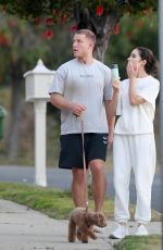 OLIVIA CULPO and Christian McCaffrey Out with Their Dog in Los Angeles 05/08/2024