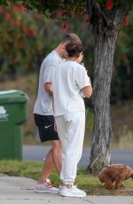 OLIVIA CULPO and Christian McCaffrey Out with Their Dog in Los Angeles 05/08/2024