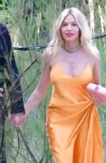 SIENNA MILLER and Oli Green Out in Venice for Wedding of Georgia Irwin and David Winter 05/25/2024