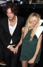 SIENNA MILLER Arrives at Anna Wintour