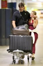 TAMMY HEMBROW and Matt Zukowski Arrives at Brisbane Airport 05/26/2024