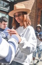 ZOE SALDANA Greets Fans and Signs Autographs as She Leaves Her Hotel in New York 05/01/2024