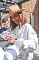 ZOE SALDANA Greets Fans and Signs Autographs as She Leaves Her Hotel in New York 05/01/2024