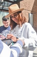 ZOE SALDANA Greets Fans and Signs Autographs as She Leaves Her Hotel in New York 05/01/2024