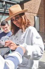 ZOE SALDANA Greets Fans and Signs Autographs as She Leaves Her Hotel in New York 05/01/2024