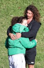 ABBIE CHATFIELD and Adam Hyde Out at a Park in Sydney 06/18/2024