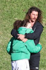 ABBIE CHATFIELD and Adam Hyde Out at a Park in Sydney 06/18/2024