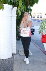 AMANDA BYNES Arrives at Friend