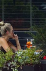 AMY ROBACH Enjoying a Drink with a Friend in New York 06/21/2024