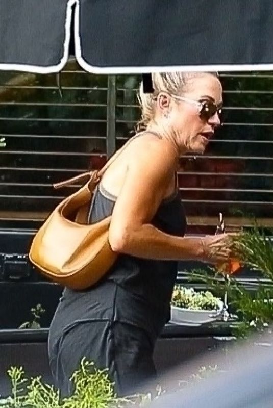 AMY ROBACH Enjoying a Drink with a Friend in New York 06/21/2024