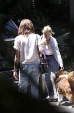 AUBREY PLAZA Out with Her Dog and Boyfriend Jeff Baena in Los Angeles 06/21/2024