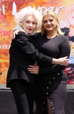 BEBE REXHA at Cyndi Lauper Hand and Footprint in Cement Ceremony in Hollywood 06/04/2024