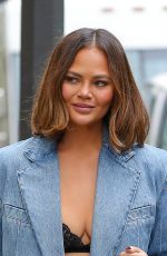 CHRISSY TEIGEN Leaves Bergdorf Goodman in New York 05/17/2024