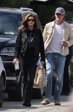 CINDY CRAWFORD and Rande Gerber Out Shopping in Malibu 05/25/2024