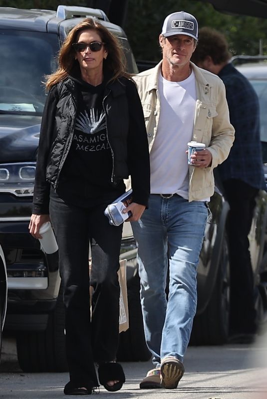 CINDY CRAWFORD and Rande Gerber Out Shopping in Malibu 05/25/2024