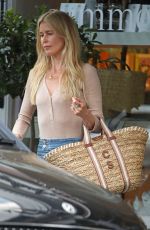 CLAUDIA SCHIFFER Leaves Daylesford Farm Shop in Notting Hill 06/26/2024