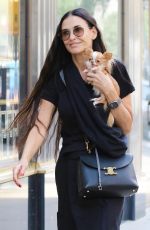DEMI MOORE Out with Her Dog in New York 06/04/2024