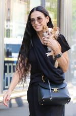 DEMI MOORE Out with Her Dog in New York 06/04/2024