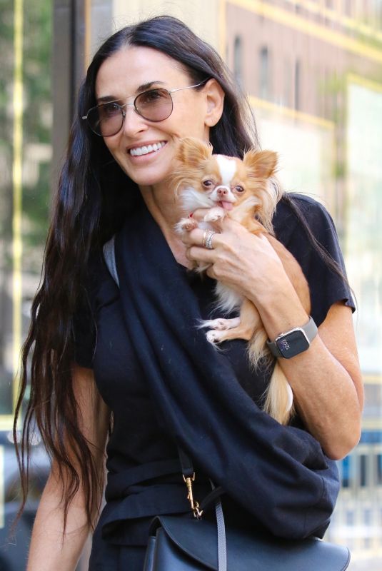 DEMI MOORE Out with Her Dog in New York 06/04/2024