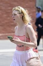 ELLE FANNING Out and About in New York 06/04/2024