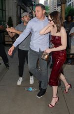 EMMA STONE in a Cherry Red Leather Dress Out in New York 06/21/2024