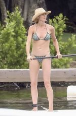GISELE BUNDCHEN in Bikini Paddle Boarding in Miami 06/15/2024