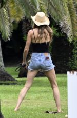 GISELE BUNDCHEN Out eith Her Dog on Father