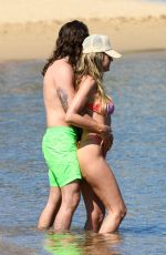 HEIDI KLUM in Bikini on the Beach in Sardinia 06/26/2024