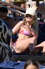 HEIDI KLUM in Bikini on the Beach in Sardinia 06/26/2024