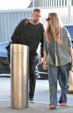 JENNIFER LAWRENCE and Cooke Maroney Arrives at JFK Airport in New York 06/01/2024