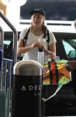 JOJO SIWA Kissing an Unidentified Woman as at LAX 05/30/2024