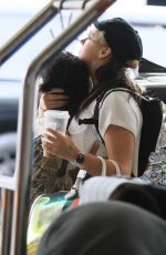 JOJO SIWA Kissing an Unidentified Woman as at LAX 05/30/2024