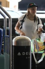 JOJO SIWA Kissing an Unidentified Woman as at LAX 05/30/2024