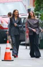 KATIE HOLMES in a Stylish Pantsuit and Red Heels Meeting with a Friend in New York 06/11/2024