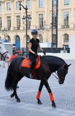 KENDALL JENNER Riding on Horseback Through Paris 06/22/2024