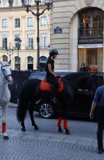 KENDALL JENNER Riding on Horseback Through Paris 06/22/2024