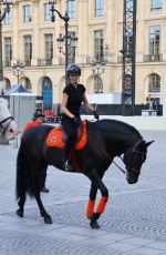 KENDALL JENNER Riding on Horseback Through Paris 06/22/2024