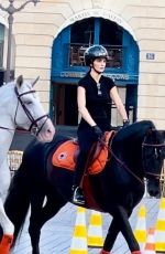 KENDALL JENNER Riding on Horseback Through Paris 06/22/2024