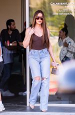 KHLOE KARDASHIAN Filming with Scott Disick at His Calabasas Luxury Motors Dealership in Calabasas 06/26/2024