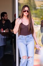 KHLOE KARDASHIAN Filming with Scott Disick at His Calabasas Luxury Motors Dealership in Calabasas 06/26/2024