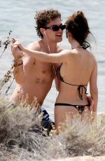 LENI KLUM in Bikini at a Beach in Sardinia 06/19/2024
