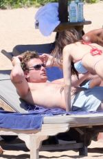 LENI KLUM in Bikini on the Beach in Sardinia 06/26/2024