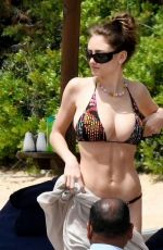 LENI KLUM ina Colorful Bikini at a Beach in Sardinia 06/19/2024