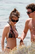LENI KLUM ina Colorful Bikini at a Beach in Sardinia 06/19/2024