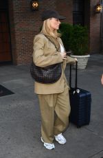 MARGOT ROBBIE Leaves Her Hotel in New York 06/07/2024