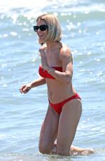 MICHELLE HUNZIKER in a Red Bikini at Alpemare Beach in Forte Dei Marmi 06/03/2024