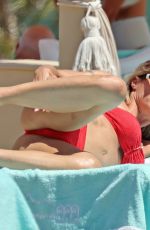 MICHELLE HUNZIKER in a Red Bikini at Alpemare Beach in Forte Dei Marmi 06/03/2024