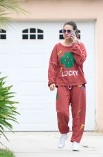 MILA KUNIS Dropping by a Friends House in Los Angeles 05/29/2024